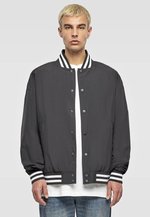 BuildYourBrand Gestreifte Collegejacke mit Druckknopfleiste, Black XS, BY259 – Bild 1