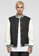 BuildYourBrand Oldschool College Jacket in Schwarz-Weiß, Black/White XS, BY269 – Bild 1