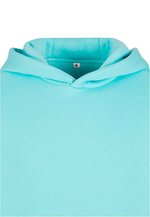 Fluffy Hoody – Bild 7