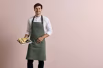 Premier Workwear Annex Oxford Apron with Faux Leather Strap – Moss Green (ca. Pantone 418C)